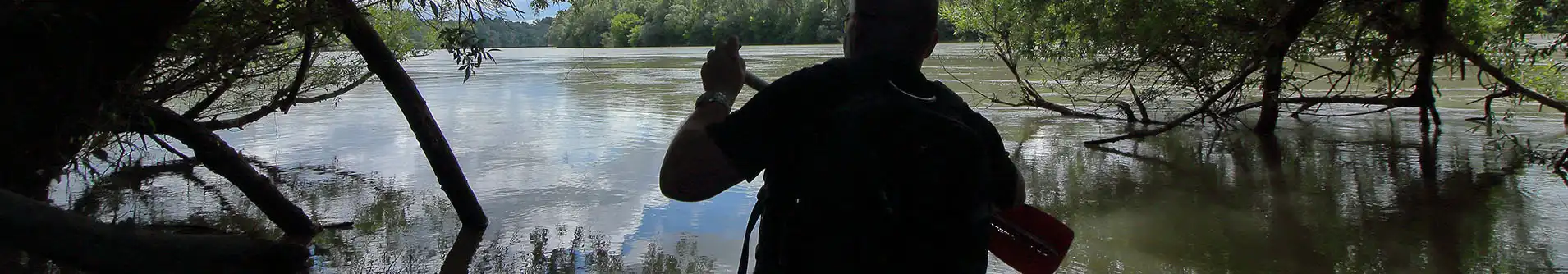 Tour guide - In canoe on the river Drava
